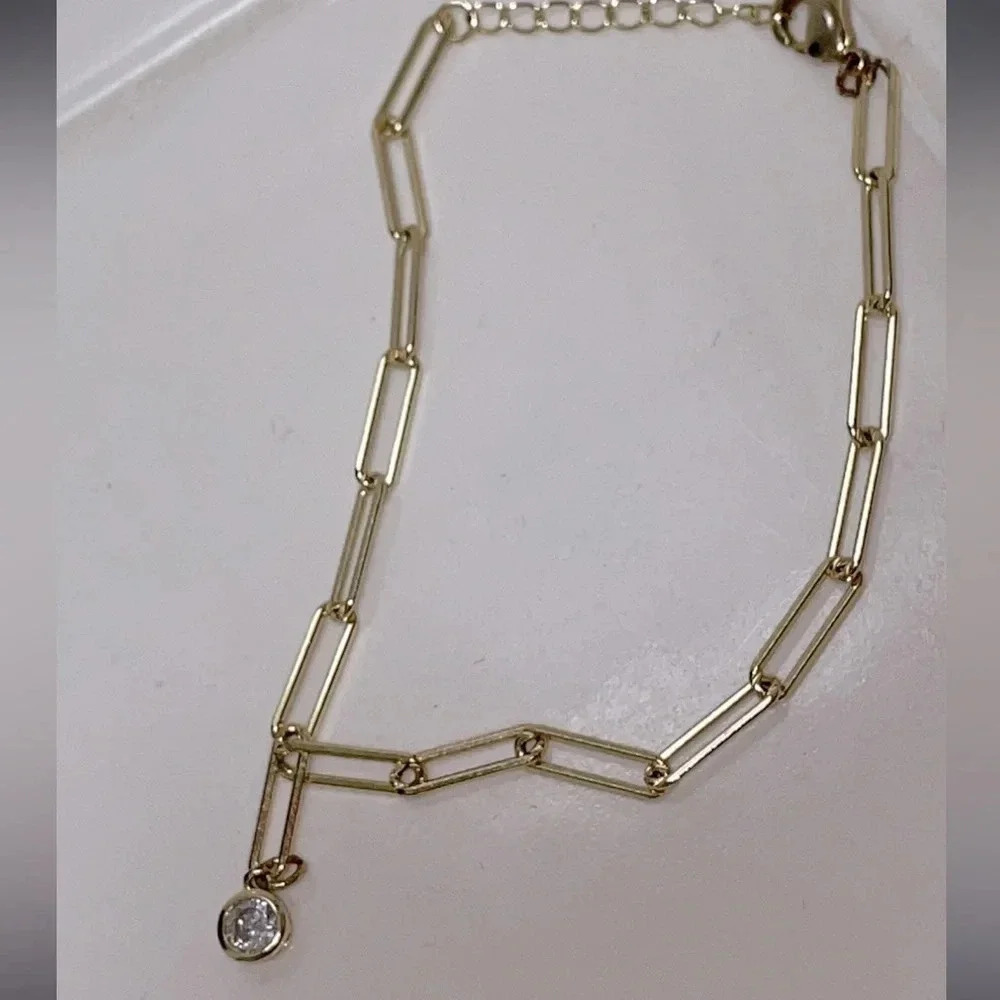 Nordstrom Jewelry Gold-Tone Brass Chain bracelet with clear dangling crystal